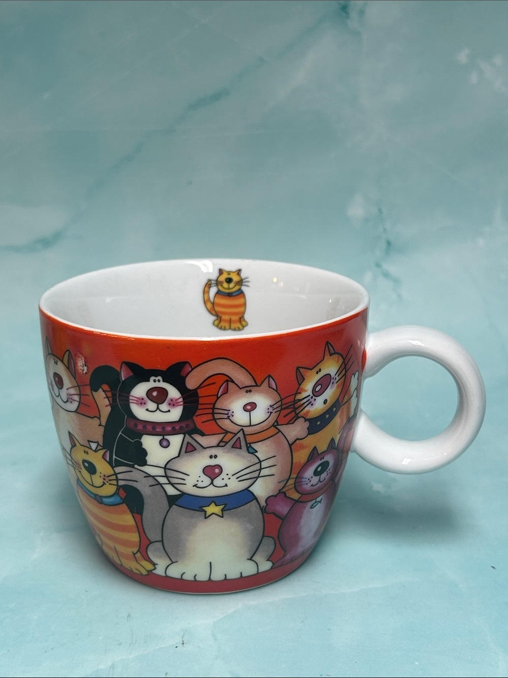 Ceramic Cat-Themed Coffee Mug in Orange by Stokes